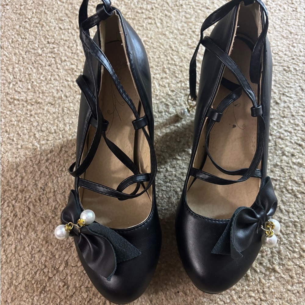 Chic Black Heels with Bow and Pearl Accent